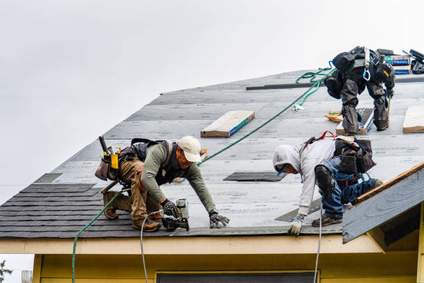 Professional Roofing technician working in South Hill, NY